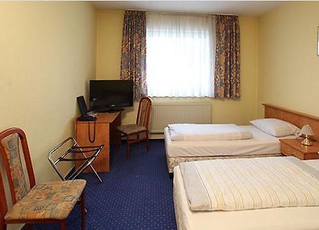 Albatros Airport Hotel Mörfelden-Walldorf Pokoj fotografie